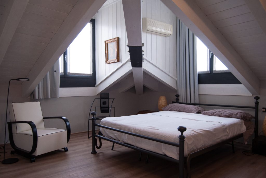 A bed with a metal bed frame