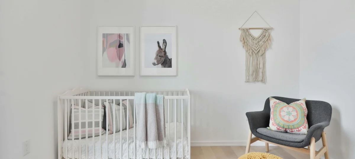 A room with a baby crib